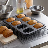 8 Compartment Non-Stick Carbon Steel Mini Bread Loaf Pan - 2 3/8" x 3 5/8" x 1 3/8" Cavities